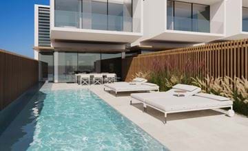 Maisons de ville contemporaines haut de gamme avec piscine à proximité de la plage