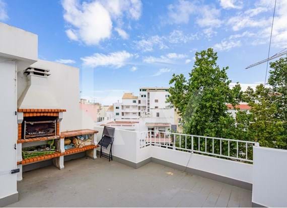 T2 in the Center of Alvor triplex, with balconies and a Terrace with Barbeque at the top.