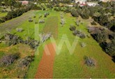 Flat land with good access from a tarmac road, with a tank and a daughter-in-law with water