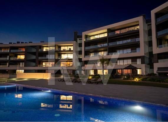 2 bedroom apartment, with sea view, garage box for 2 cars in a gated community with gardens and a swimming pool.