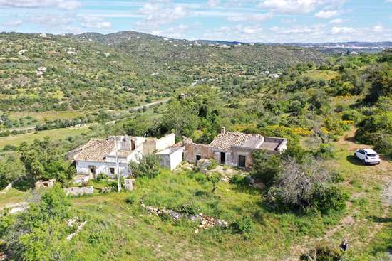 Elevated country plot with distant sea views and approved project ready to build near Estoi
