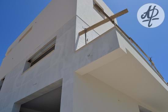 Modern and contemporary 3 storey villa with 3 bedrooms, garage and sea view for sale between Lagos and Portimão