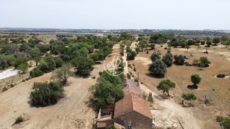 EXCLUSIVE & UNEQUALLED plot of land with old houses for renovation for sale in Mexilhoeira Grande - Alvor 