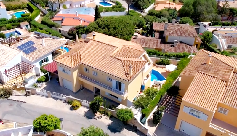 3 STOREY VILLA with private lift, 5 bedrooms, 6 bathrooms, lift, games room, swimming pool, garage and  AMAZING SEA VIEWS for sale in PRAIA DA LUZ!!