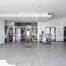 Immeuble de 2 étages composé de 1 magasin et 1 appartement de 2 chambres situé sur Nacional 125 à LAGOA 