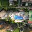Fabbricato con allocazione di servizi composto da casa con piscina, palestra e campo da tennis sito ad ALGOZ