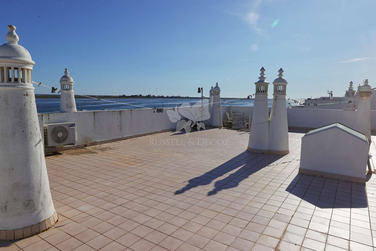 HOME2236A - One bedroom, top floor apartment with superb location and sea views in Santa Luzia, Tavira.