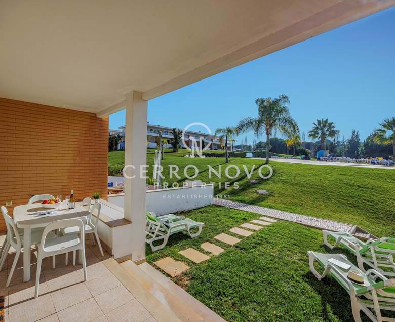 Lovely townhouse in a condominium with large garden and pool